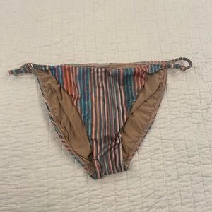 PQ bikini bottom. Multi color. Size large. No damage